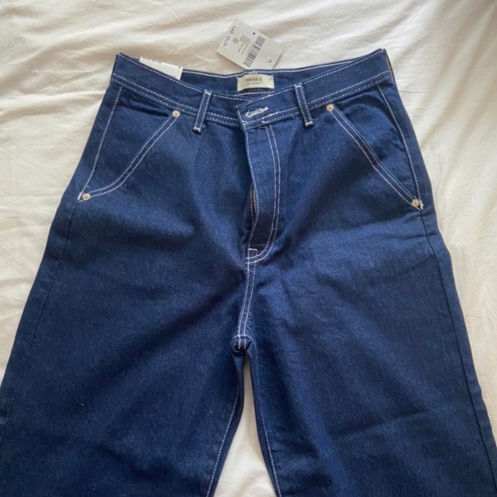 Blue jeans with white contrast stitching
